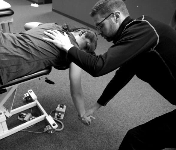 Hands-on manual therapy at Moore Performance Health